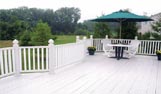 Beautiful white vinyl uPVC Decking with matching railings and decking boards